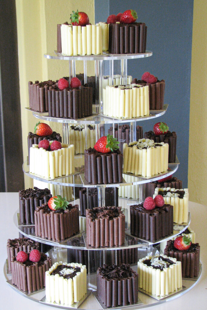 individual square chocolate cakes for a wedding